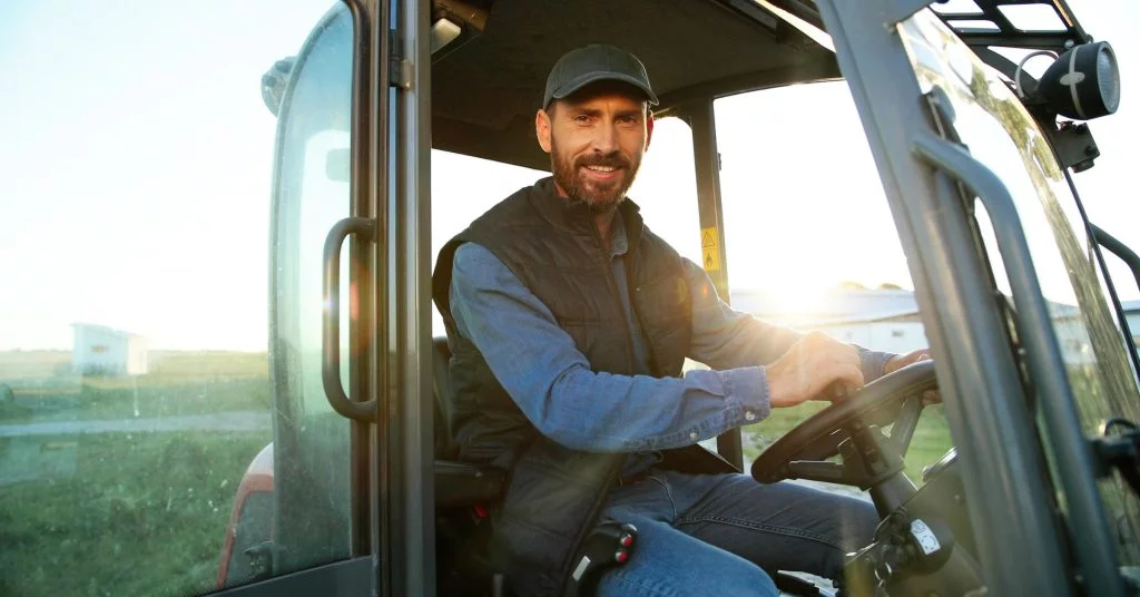 6 Essential Farming Supplies Every Farmer Should Have 2 farmers drive tractor